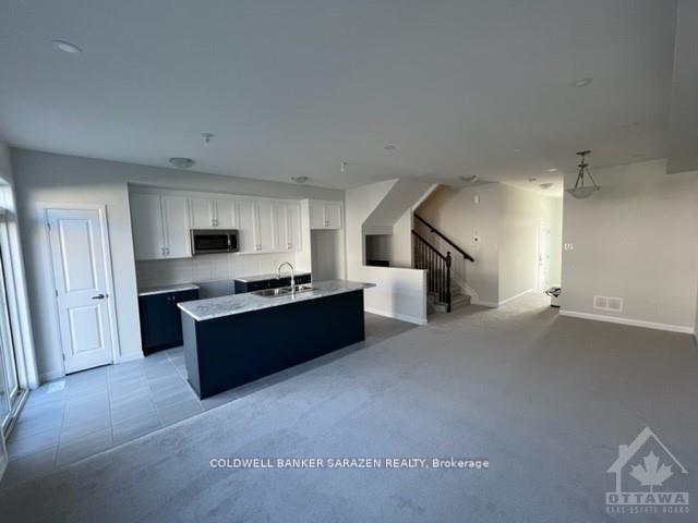 Photo 3 of 561 Aglish Mews, Ottawa, Barrhaven - Half Moon Bay — HOMEH