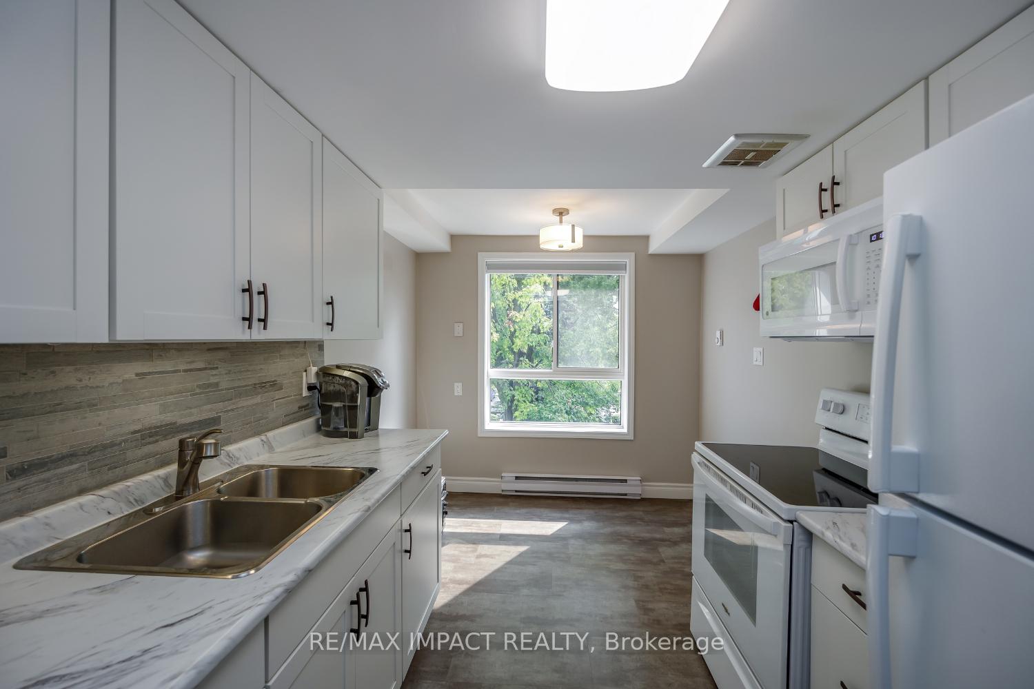 Photo 4 of Unit 31, 43 Taunton Road E, Oshawa, Taunton — HOMEH
