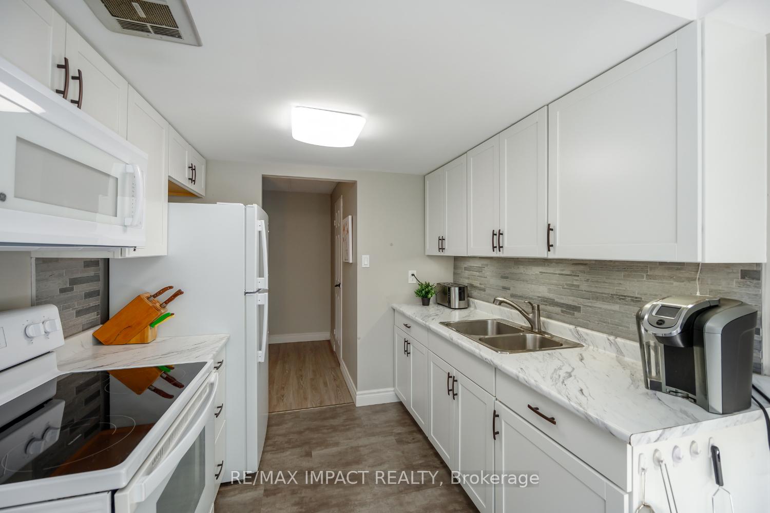 Photo 5 of Unit 31, 43 Taunton Road E, Oshawa, Taunton — HOMEH