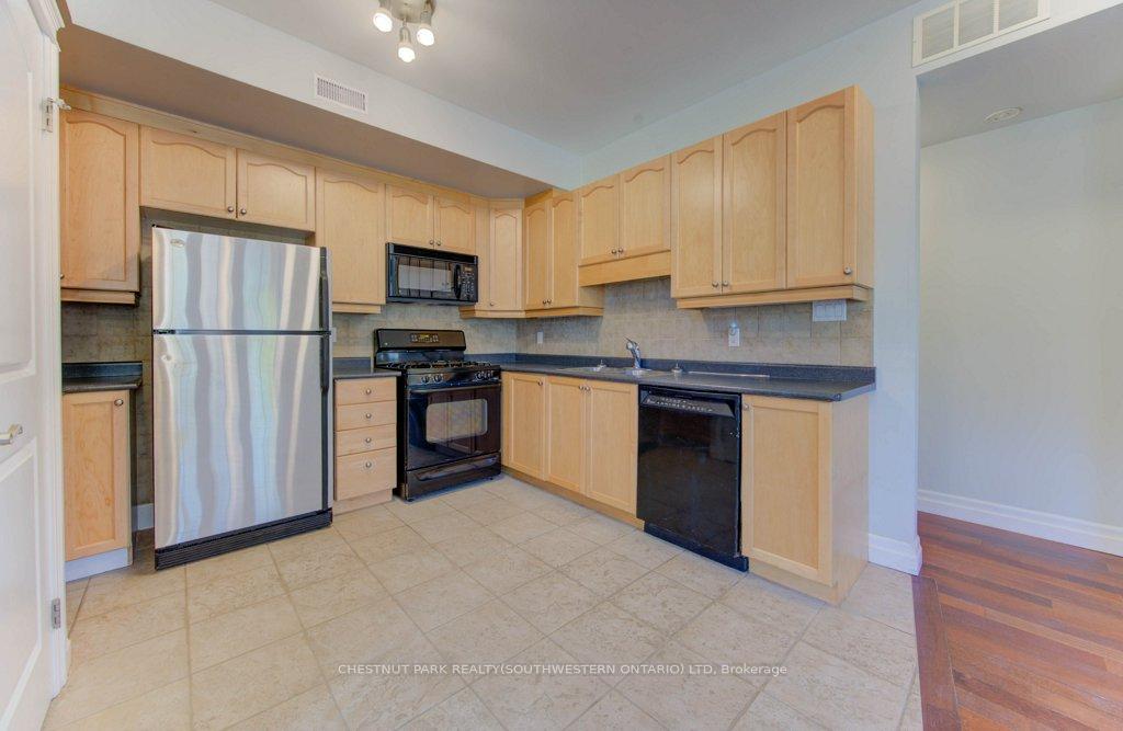 Photo 1 of Unit 101, 555 King Street E, Kitchener — HOMEH