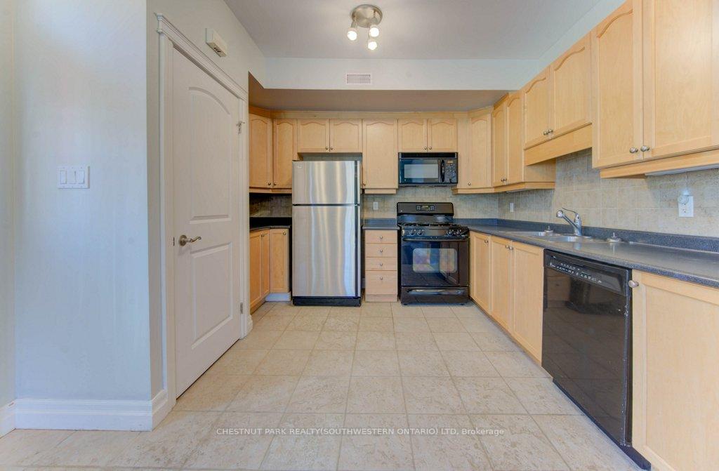 Photo 2 of Unit 101, 555 King Street E, Kitchener — HOMEH