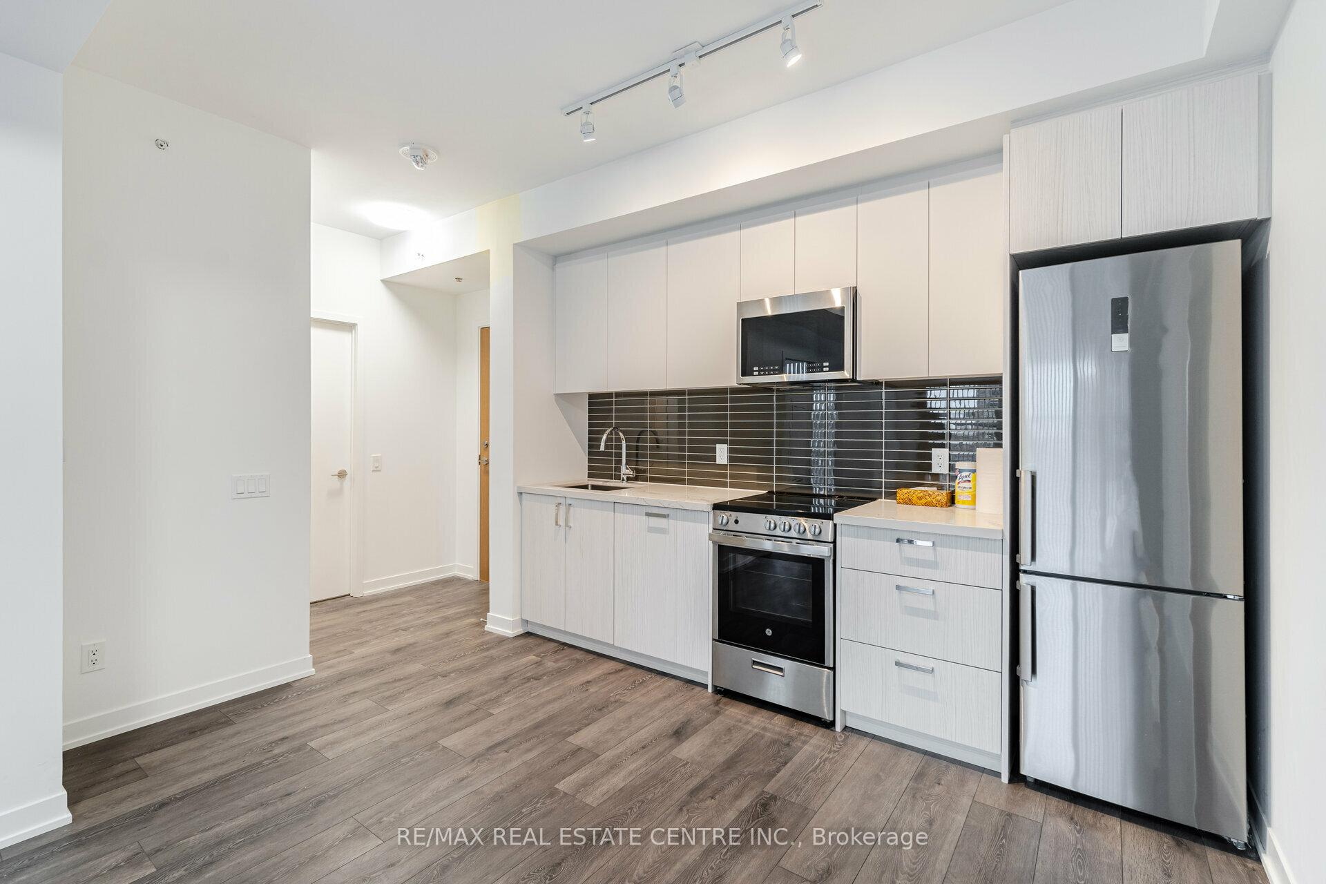 Photo 6 of Unit 405, 1787 St Clair Avenue, Toronto, Weston-Pellam Park — HOMEH