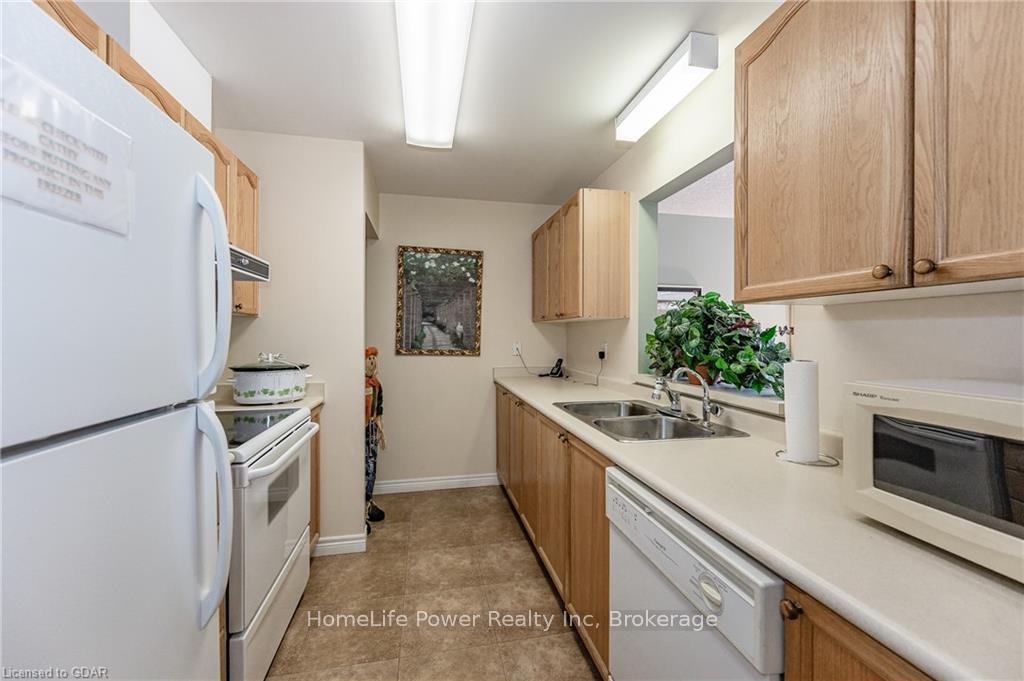 Photo 6 of Unit 404, 20 St George Street, Kitchener — HOMEH