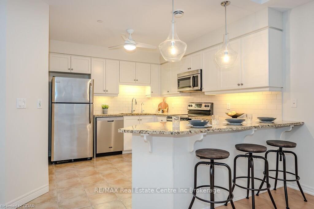 Photo 4 of Unit D403, 71 Bayberry Drive, Guelph, Village By The Arboretum — HOMEH