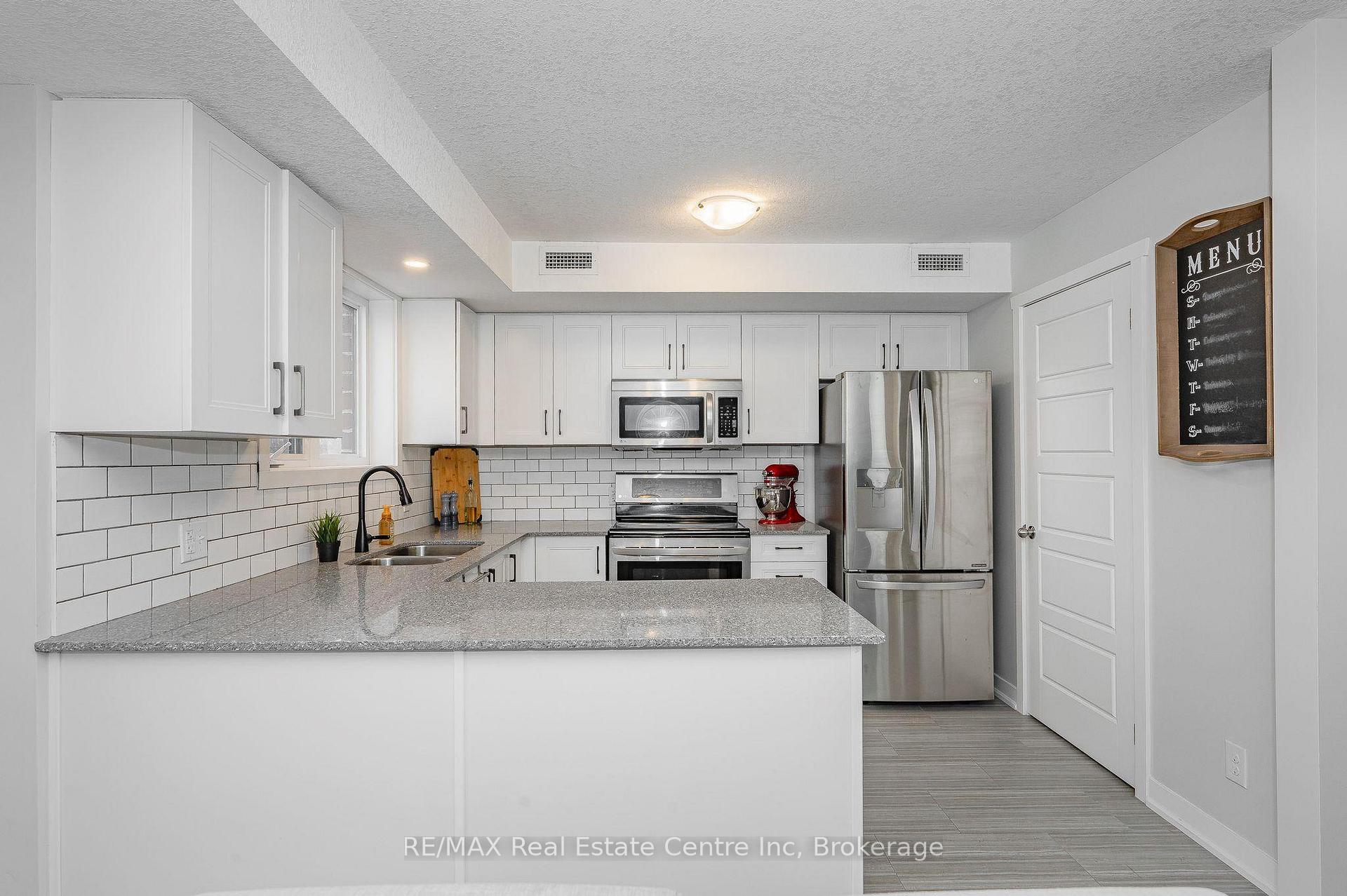 Photo 4 of Unit B4, 190 Century Hill Drive, Kitchener — HOMEH