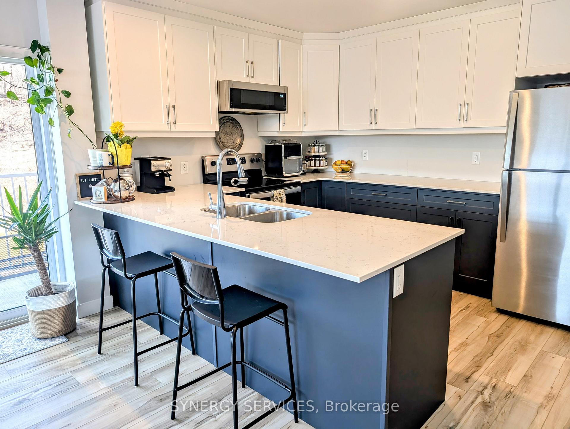 Photo 2 of Unit 410, 100 The Promenade, Central Elgin, Rural Central Elgin — HOMEH