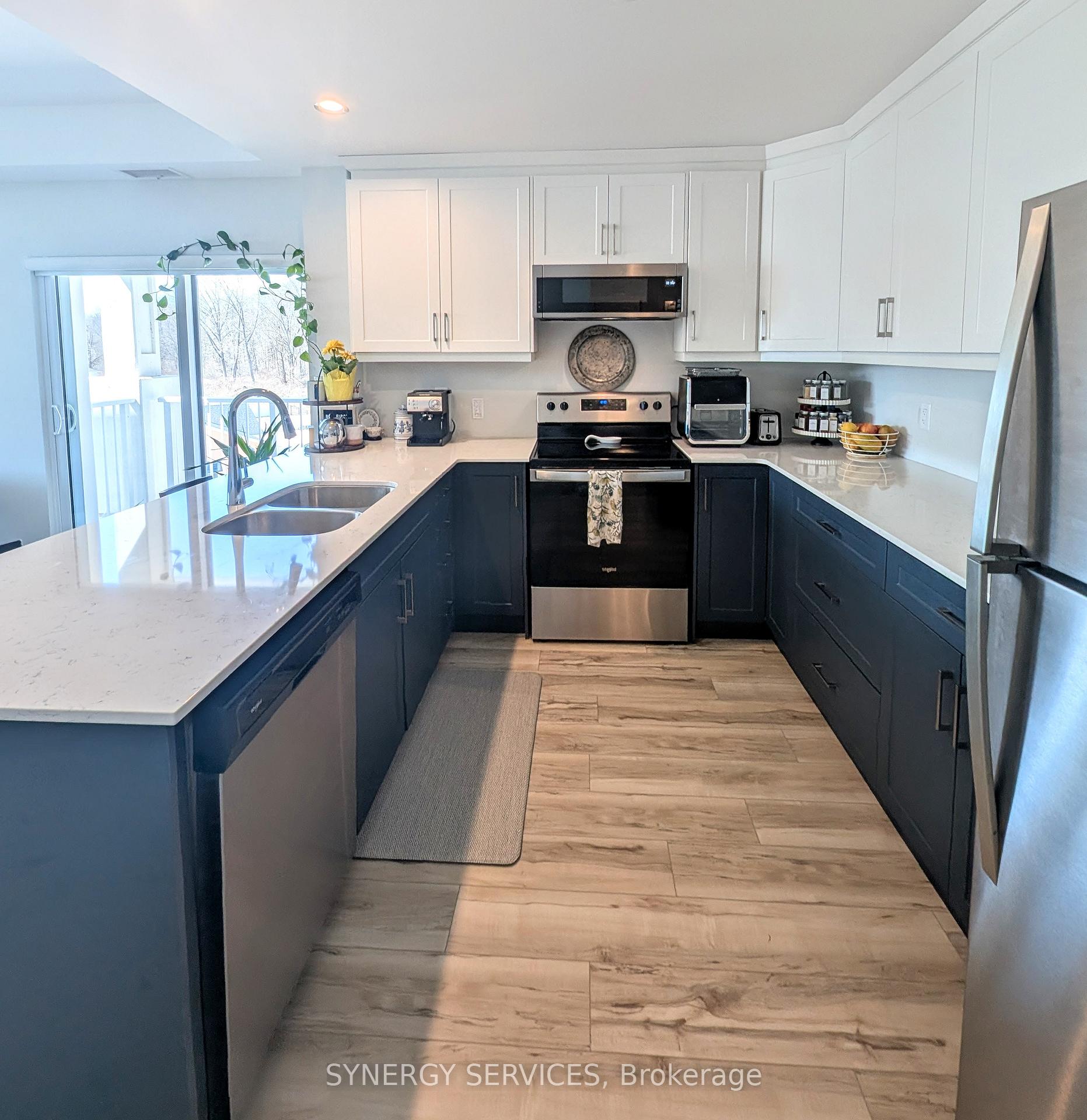 Photo 3 of Unit 410, 100 The Promenade, Central Elgin, Rural Central Elgin — HOMEH