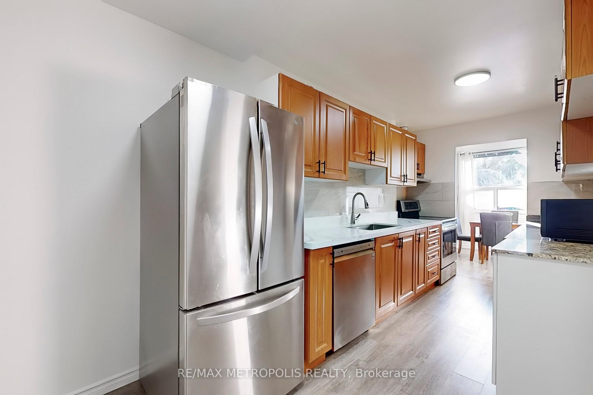 Photo 4 of Unit 106, 4060 Lawrence Avenue E, Scarborough, West Hill — HOMEH