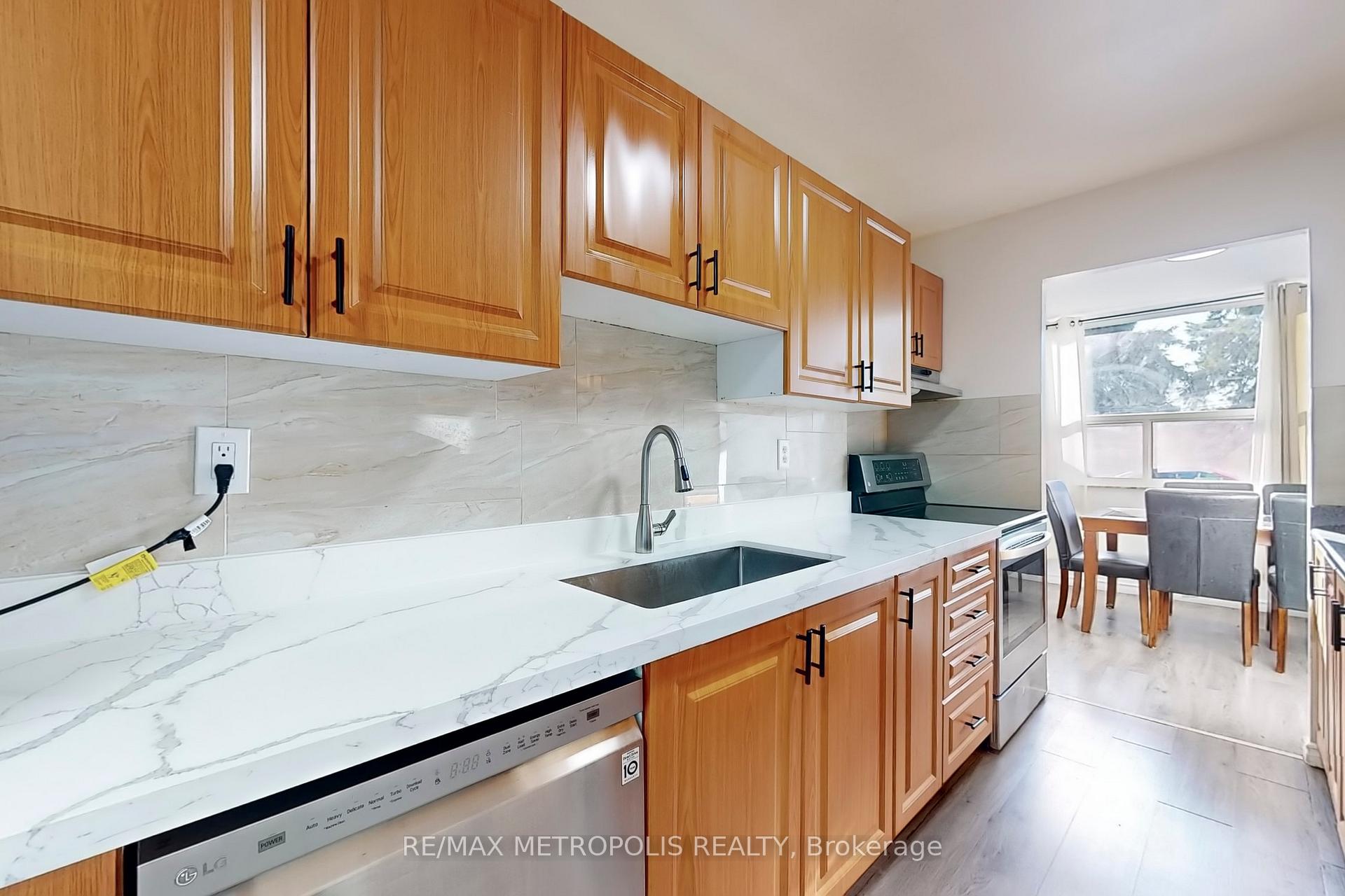 Photo 5 of Unit 106, 4060 Lawrence Avenue E, Scarborough, West Hill — HOMEH