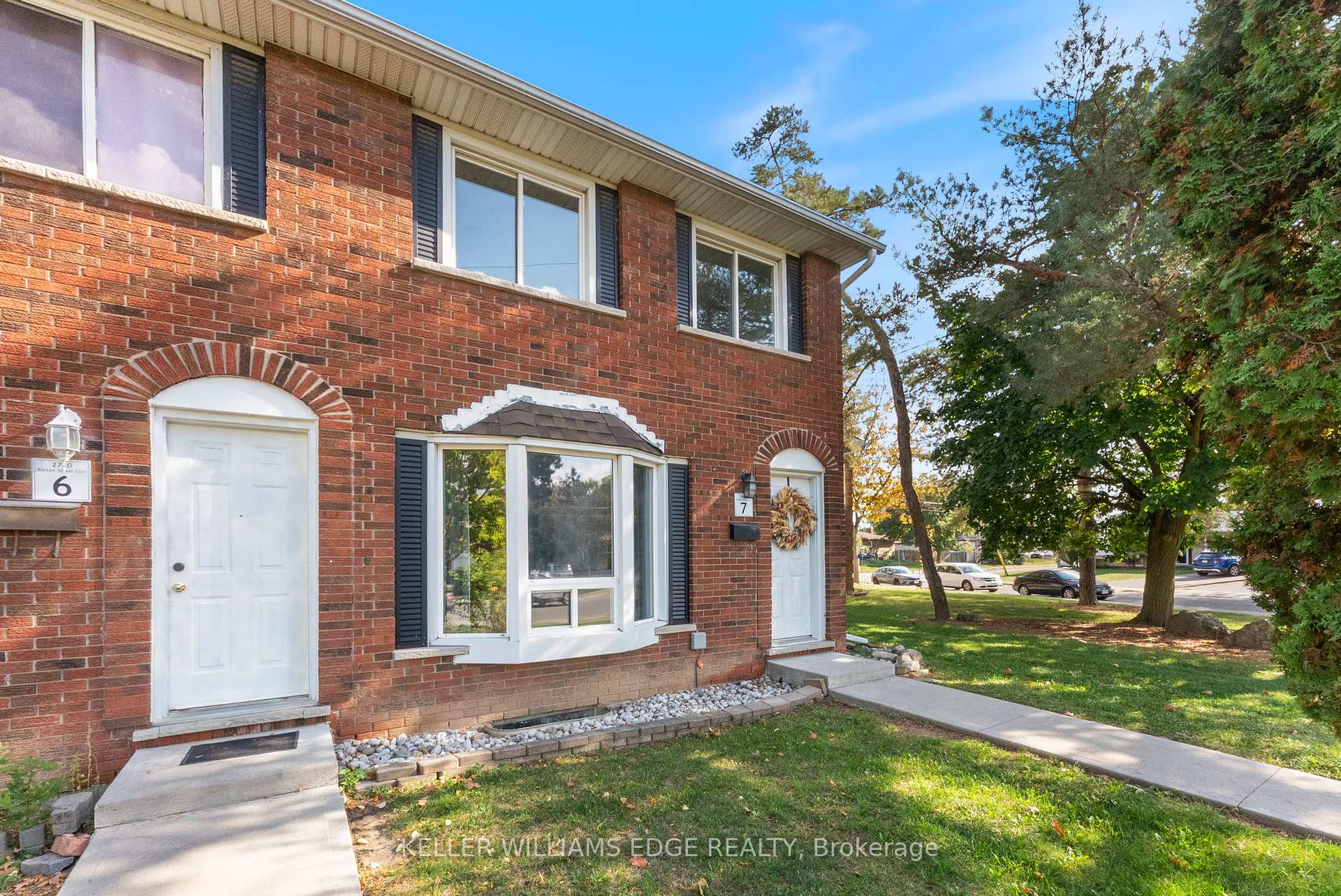 Photo 2 of Unit 7, 2700 Barton Street E, Hamilton, Riverdale — HOMEH
