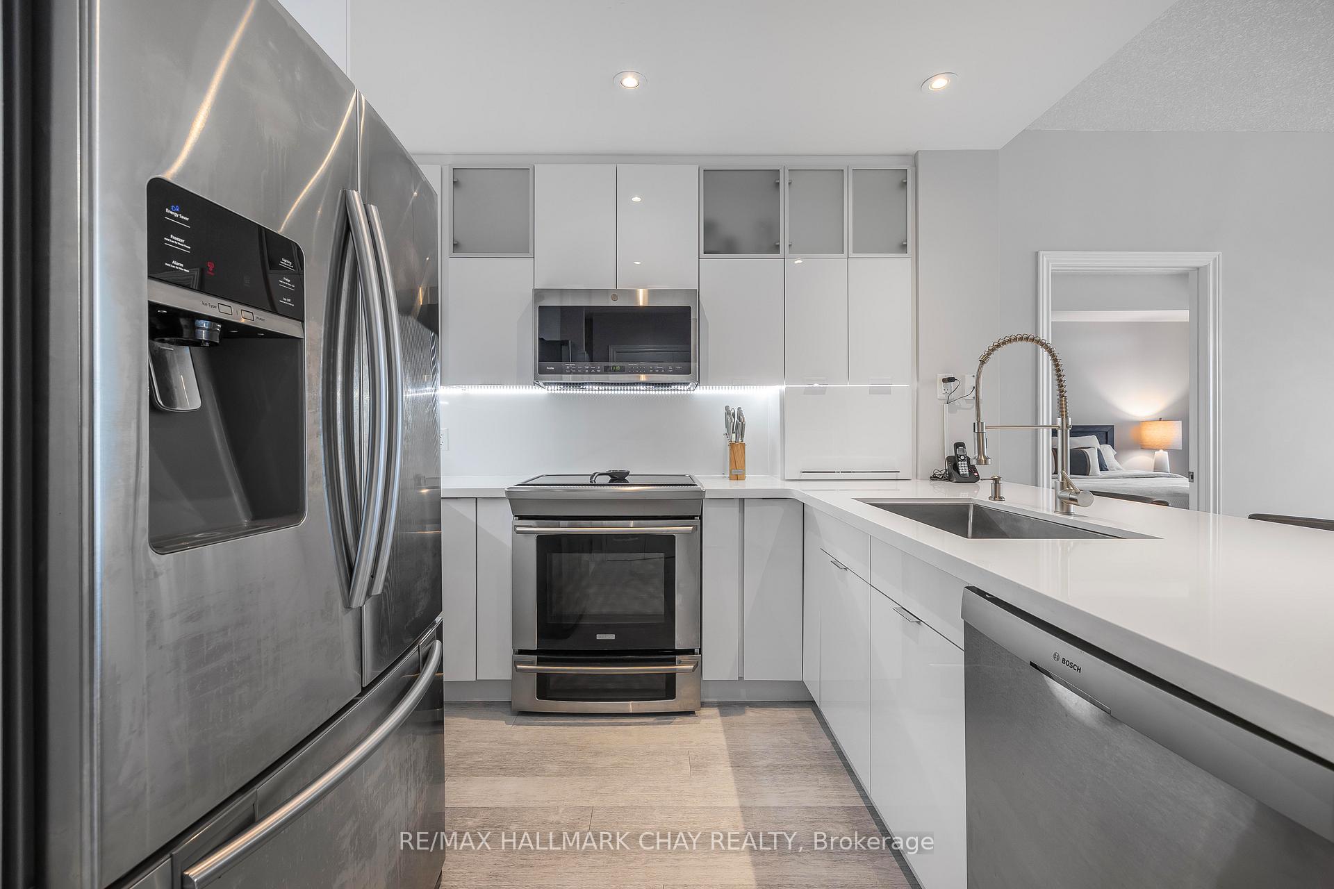Photo 4 of Unit 1308, 33 Ellen Street, Barrie, Lakeshore — HOMEH