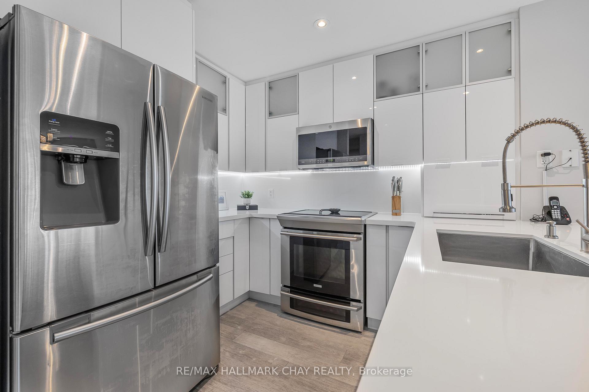 Photo 5 of Unit 1308, 33 Ellen Street, Barrie, Lakeshore — HOMEH