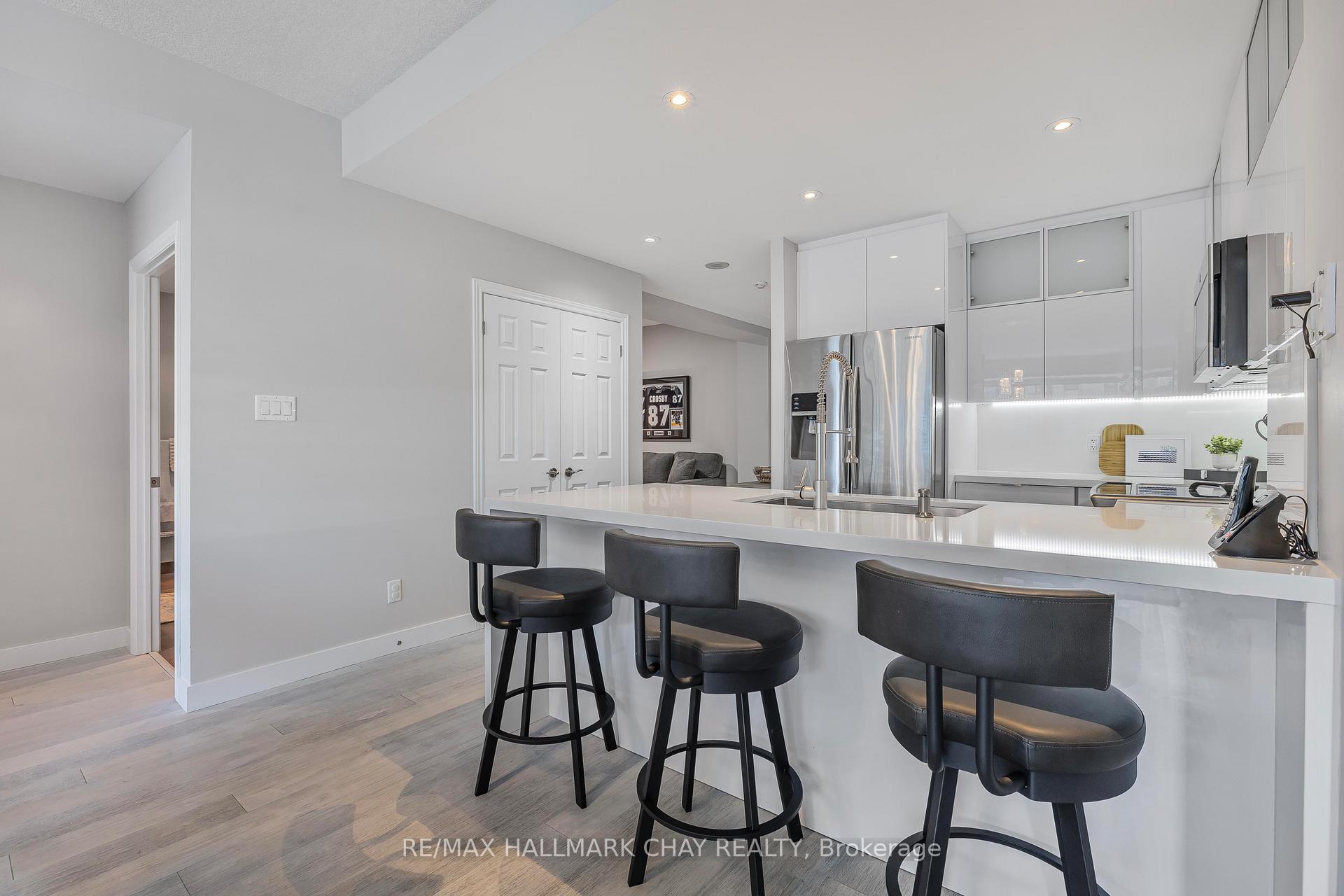 Photo 9 of Unit 1308, 33 Ellen Street, Barrie, Lakeshore — HOMEH