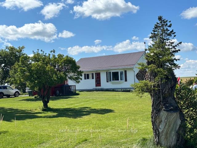 Photo 1 of 1359 Genier Road, Cochrane — HOMEH