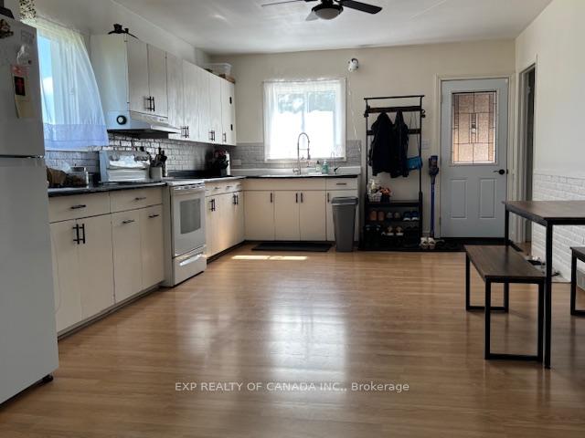 Photo 10 of 1359 Genier Road, Cochrane — HOMEH