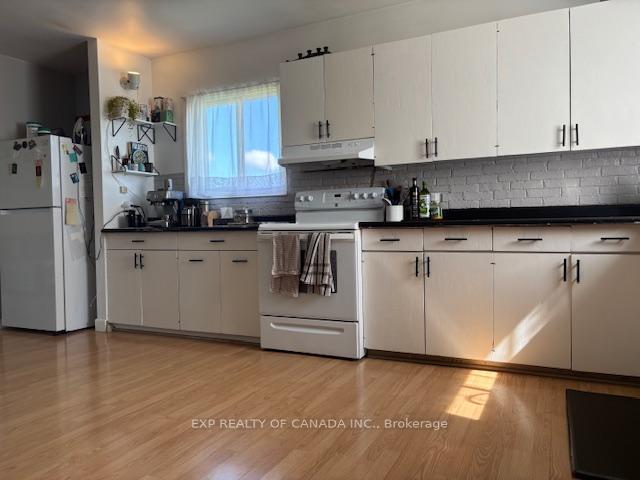Photo 11 of 1359 Genier Road, Cochrane — HOMEH