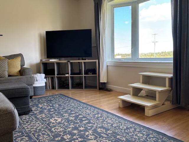 Photo 15 of 1359 Genier Road, Cochrane — HOMEH