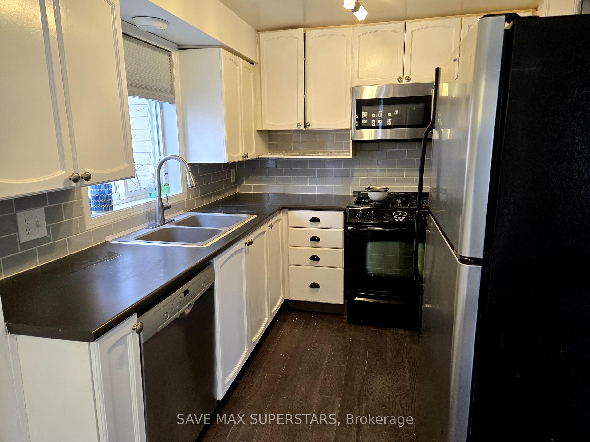 Photo 2 of 94 Wessenger Drive, Barrie, Holly — HOMEH