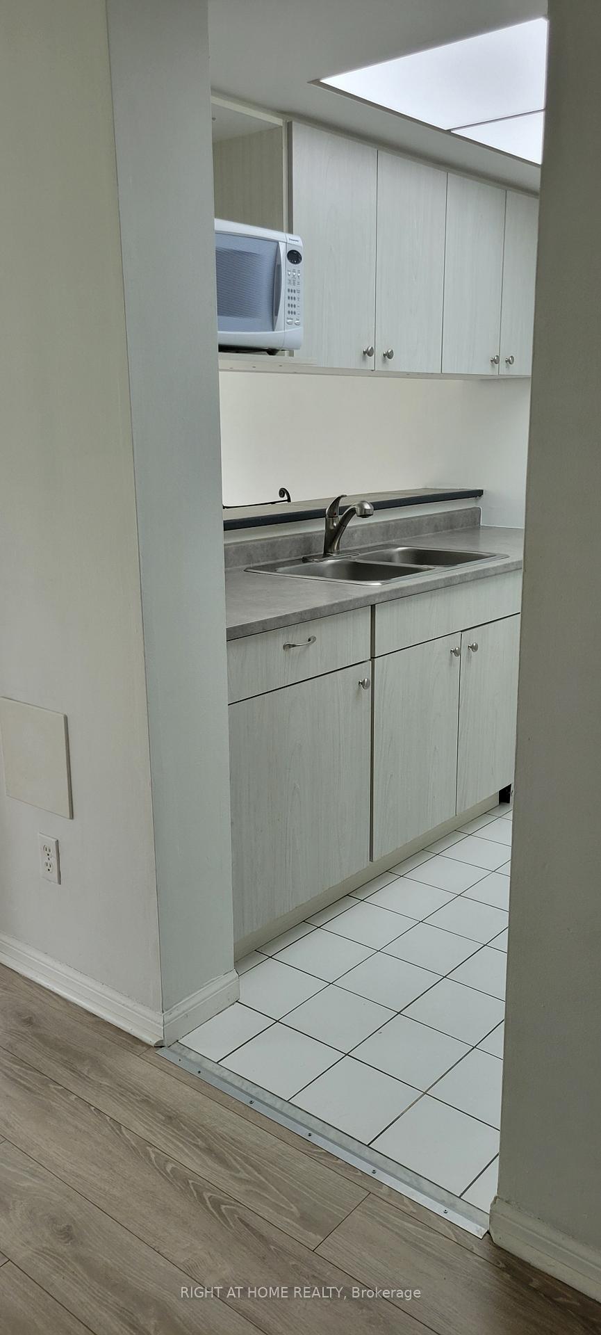 Photo 10 of Unit 101, 75 Ellen Street, Barrie, Lakeshore — HOMEH