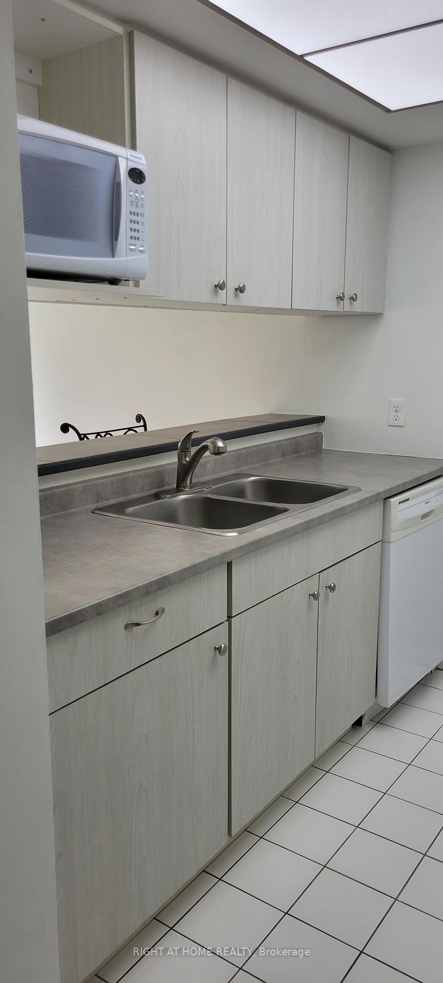 Photo 11 of Unit 101, 75 Ellen Street, Barrie, Lakeshore — HOMEH