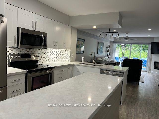 Photo 5 of Unit 43, 11 Laguna Parkway, Ramara, Brechin — HOMEH