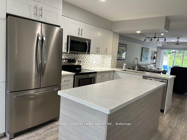 Photo 6 of Unit 43, 11 Laguna Parkway, Ramara, Brechin — HOMEH