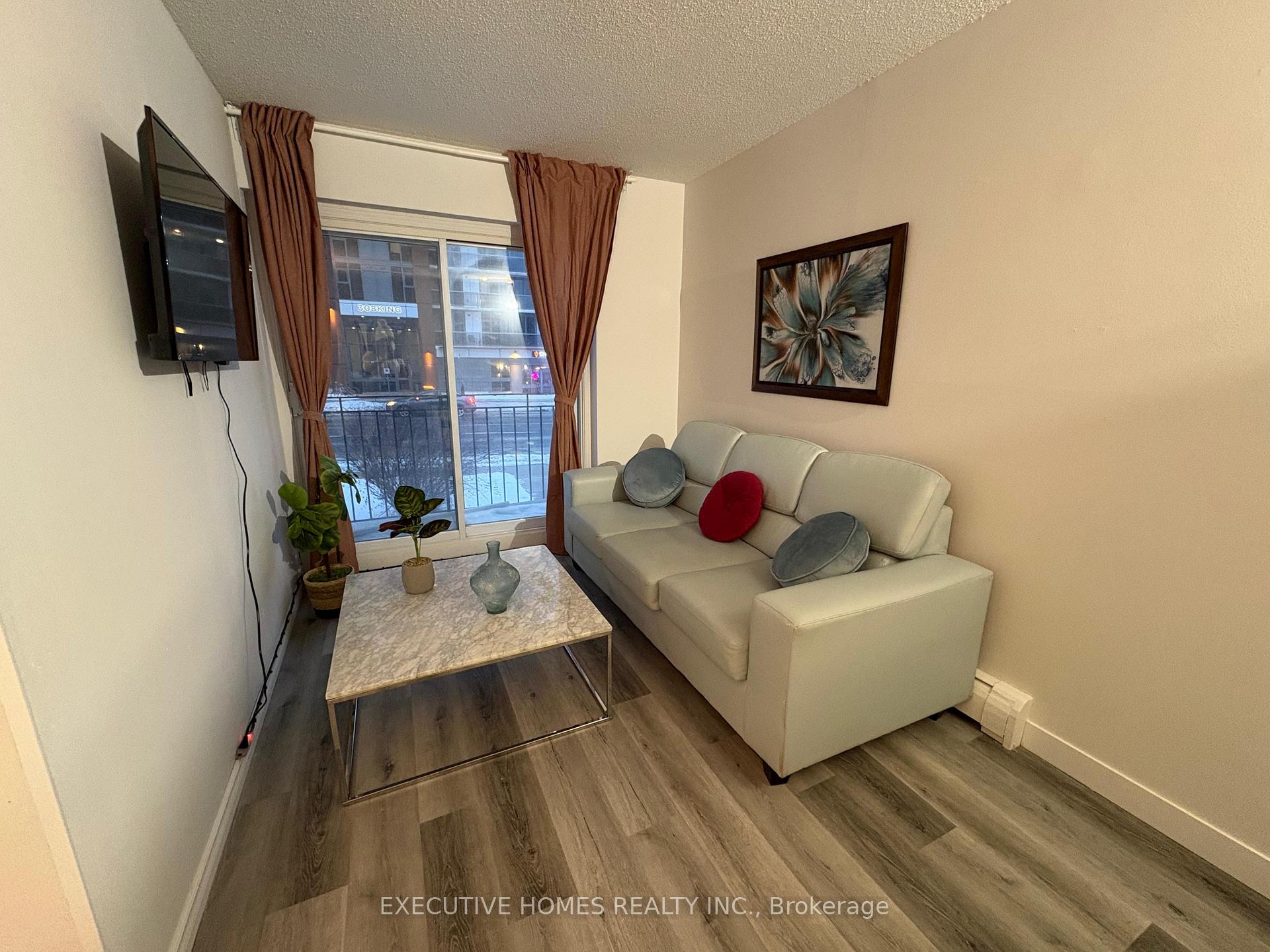 Photo 1 of Unit 8, 303 King Street N, Waterloo — HOMEH