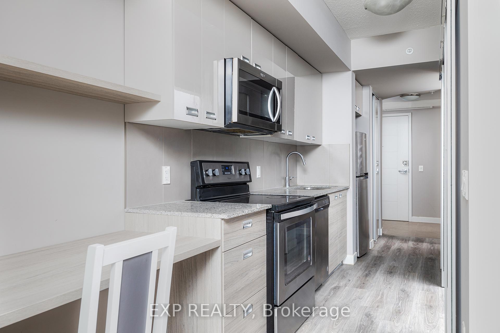 Photo 3 of Unit 407, 308 Lester Street, Waterloo — HOMEH