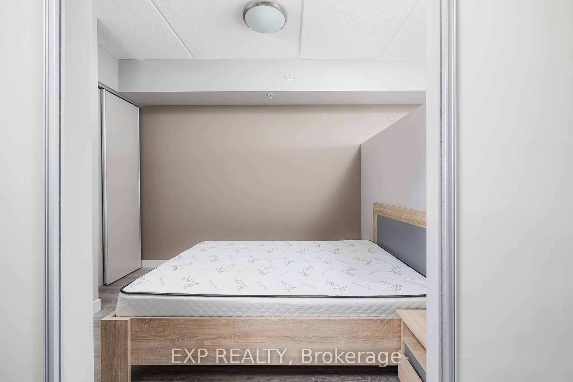 Photo 7 of Unit 407, 308 Lester Street, Waterloo — HOMEH