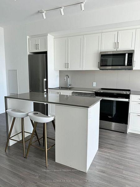 Photo 4 of Unit 402, 681 Yonge Street E, Barrie, Painswick South — HOMEH