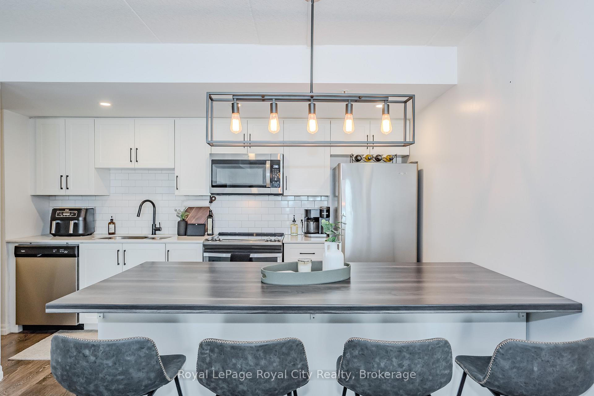 Photo 2 of Unit 205, 108 Summit Ridge Drive, Guelph, Grange Road — HOMEH