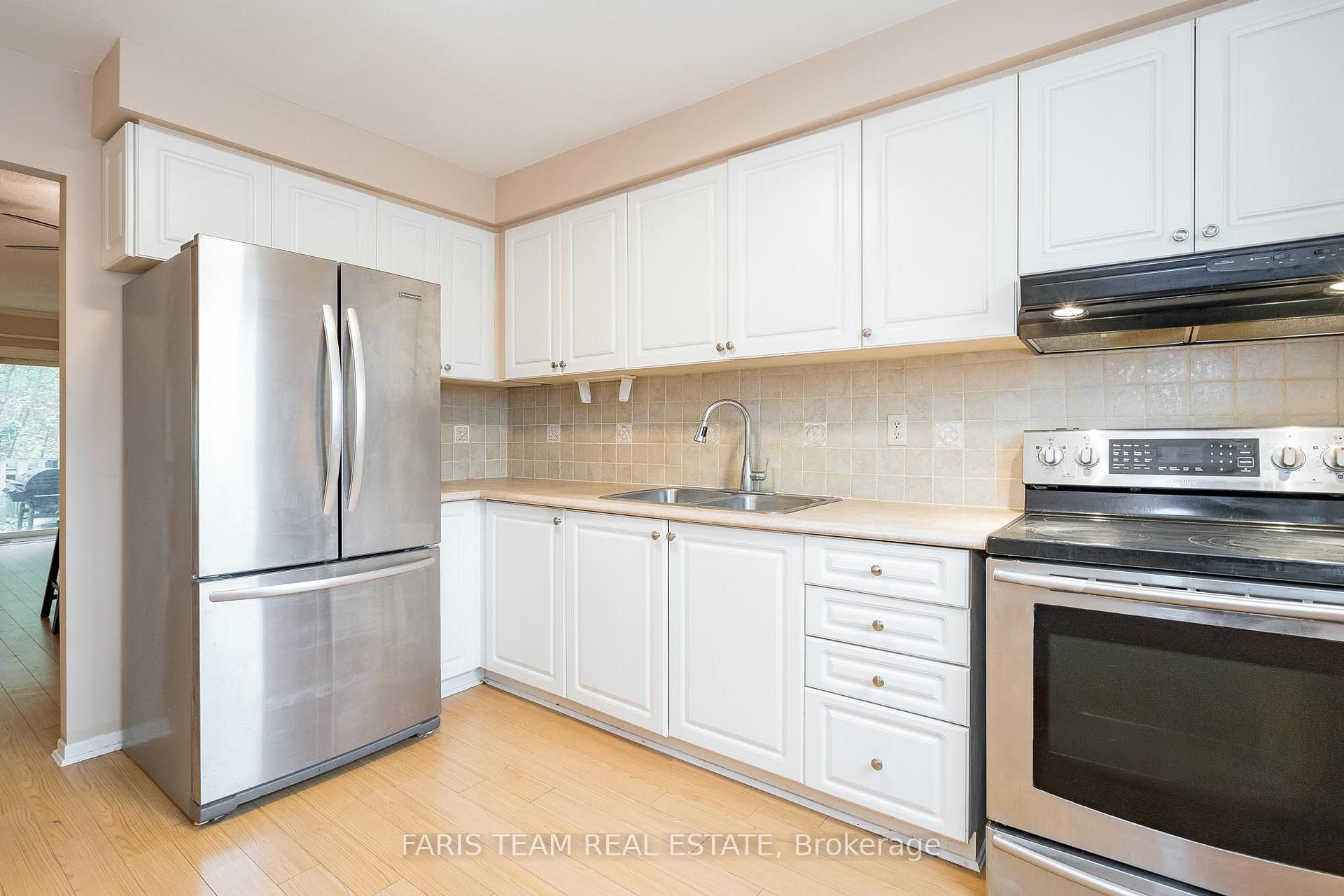 Photo 4 of Unit 48, 72 Adelaide Street, Barrie, Allandale — HOMEH