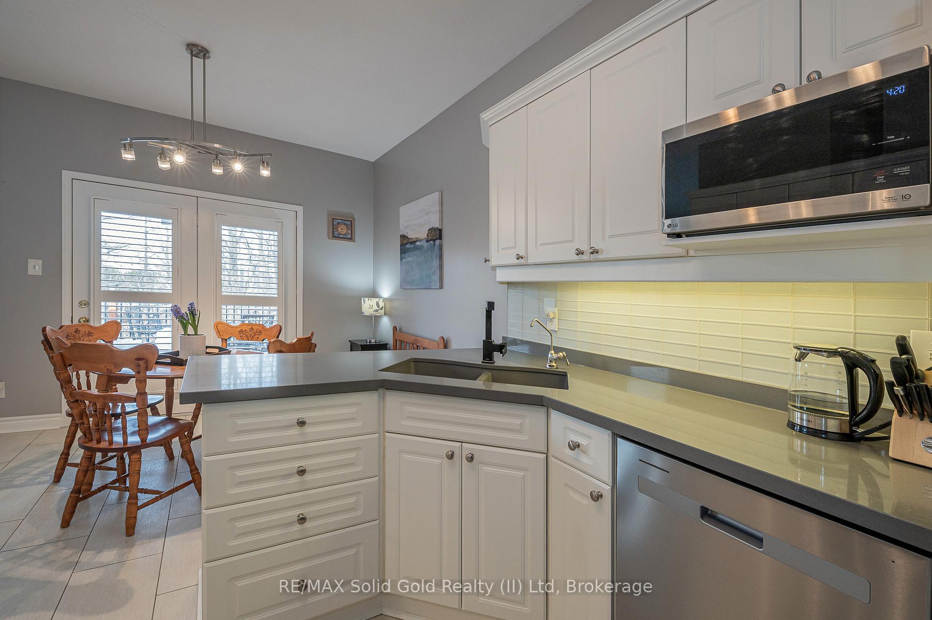 Photo 11 of Unit 12, 900 Doon Village Road, Kitchener — HOMEH