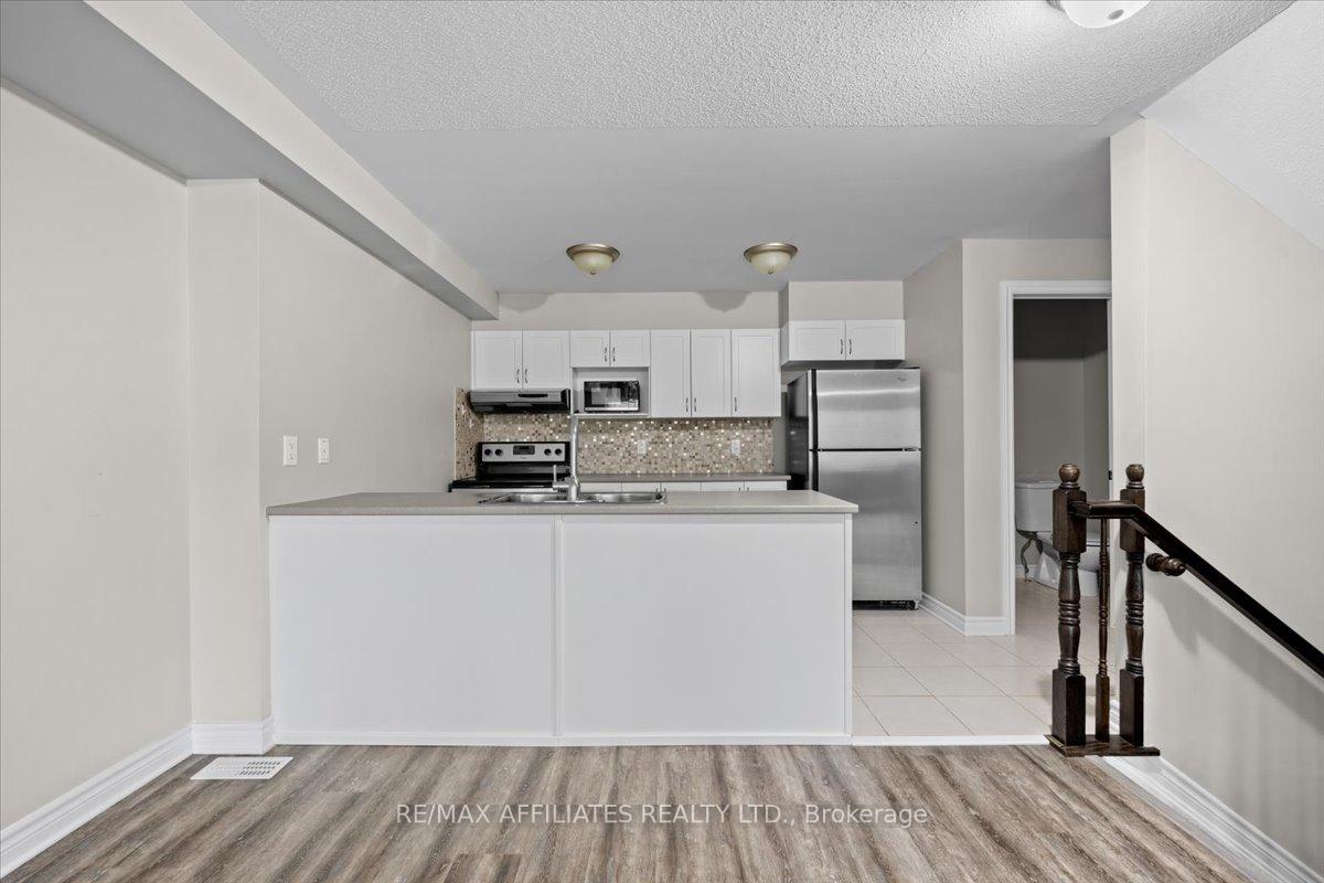 Photo 10 of Unit A, 289 Titanium Private, Ottawa, Convent Glen North — HOMEH