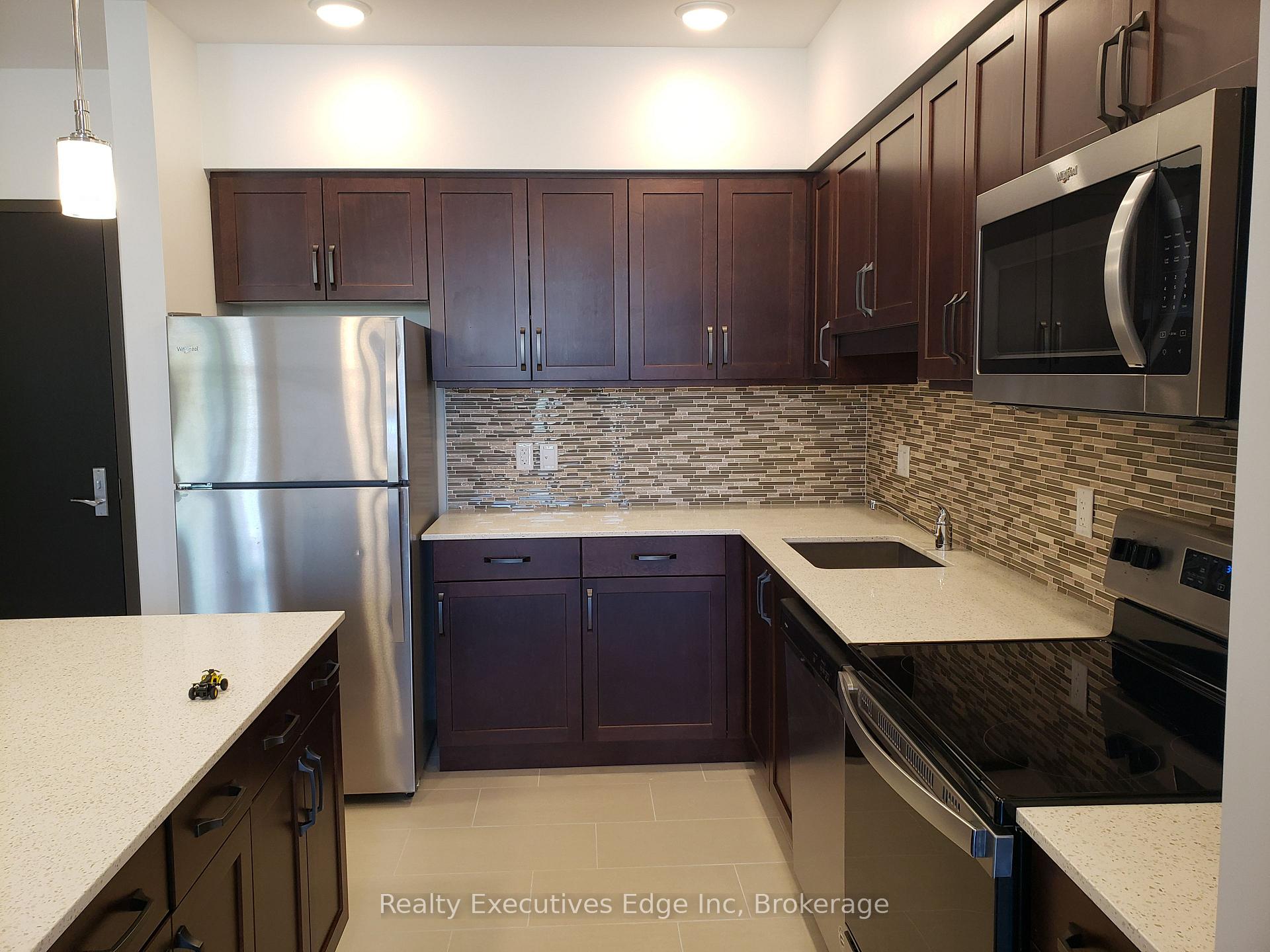 Photo 3 of Unit 415, 399 Queen Street S, Kitchener — HOMEH