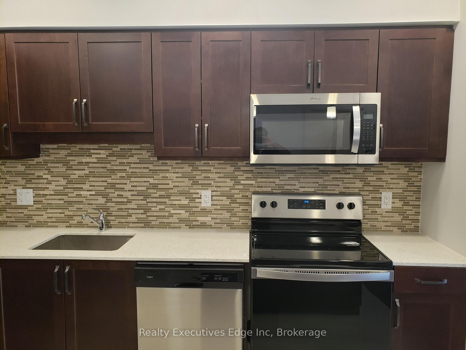 Photo 4 of Unit 415, 399 Queen Street S, Kitchener — HOMEH