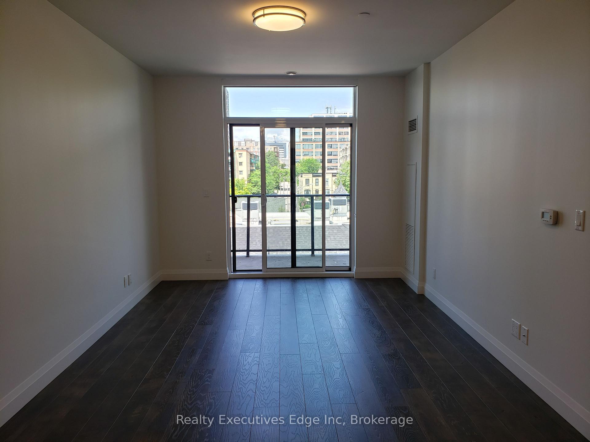 Photo 6 of Unit 415, 399 Queen Street S, Kitchener — HOMEH