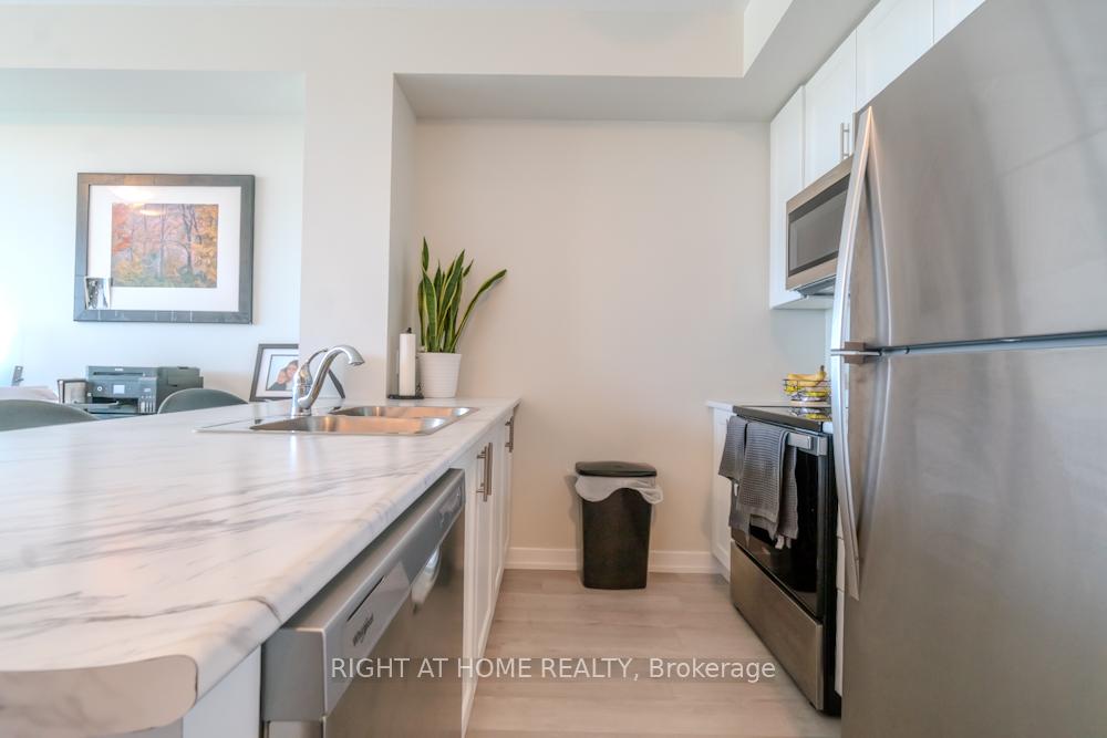 Photo 4 of Unit 1003, 460 Dundas Street E, Hamilton, Waterdown — HOMEH