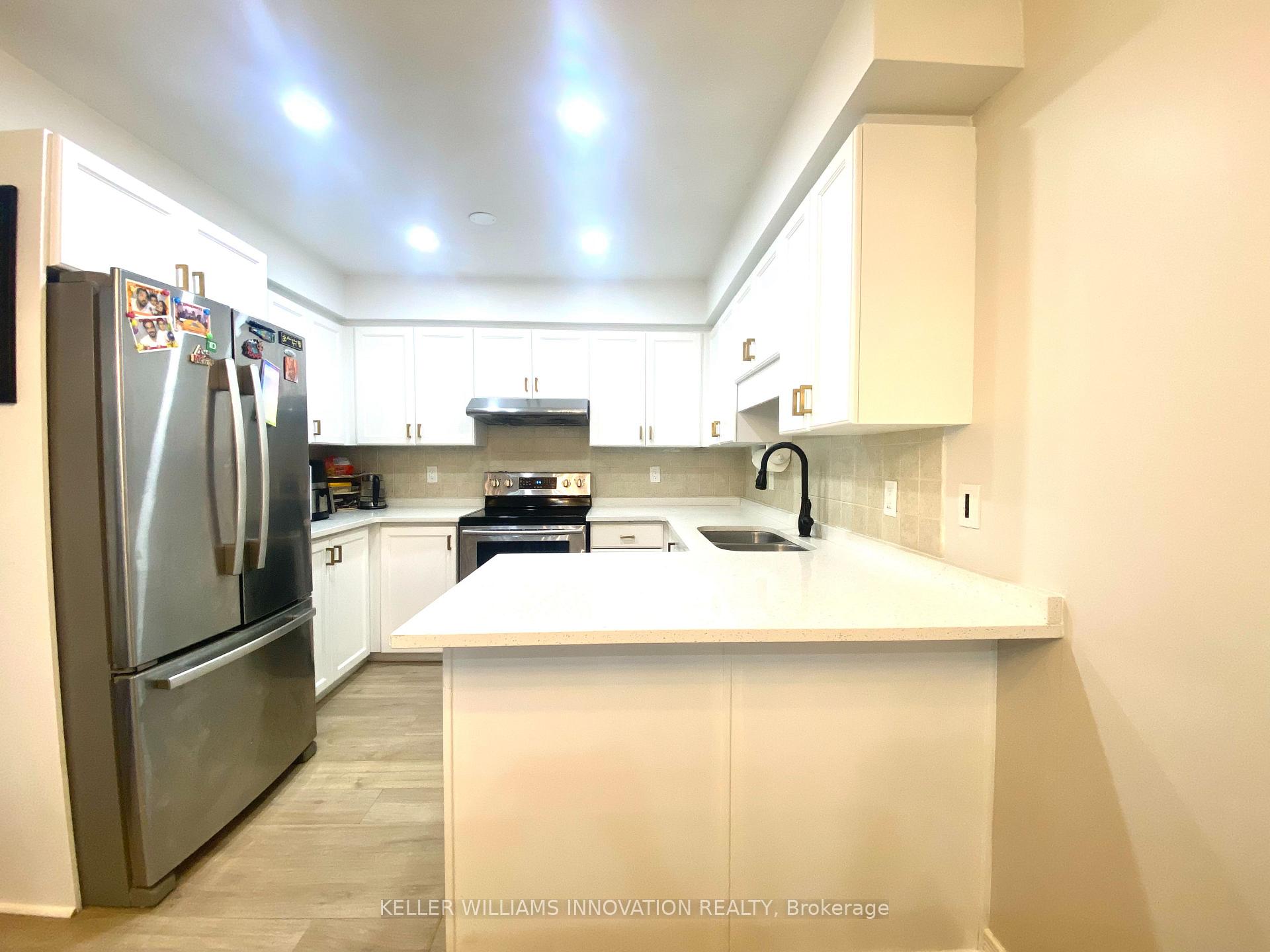 Photo 3 of Unit E33, 85 Bankside Drive, Kitchener — HOMEH