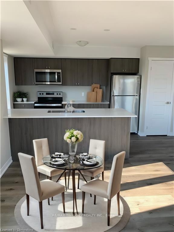 Photo 4 of Unit A16, 1331 Countrystone Drive, Kitchener, Highland West — HOMEH
