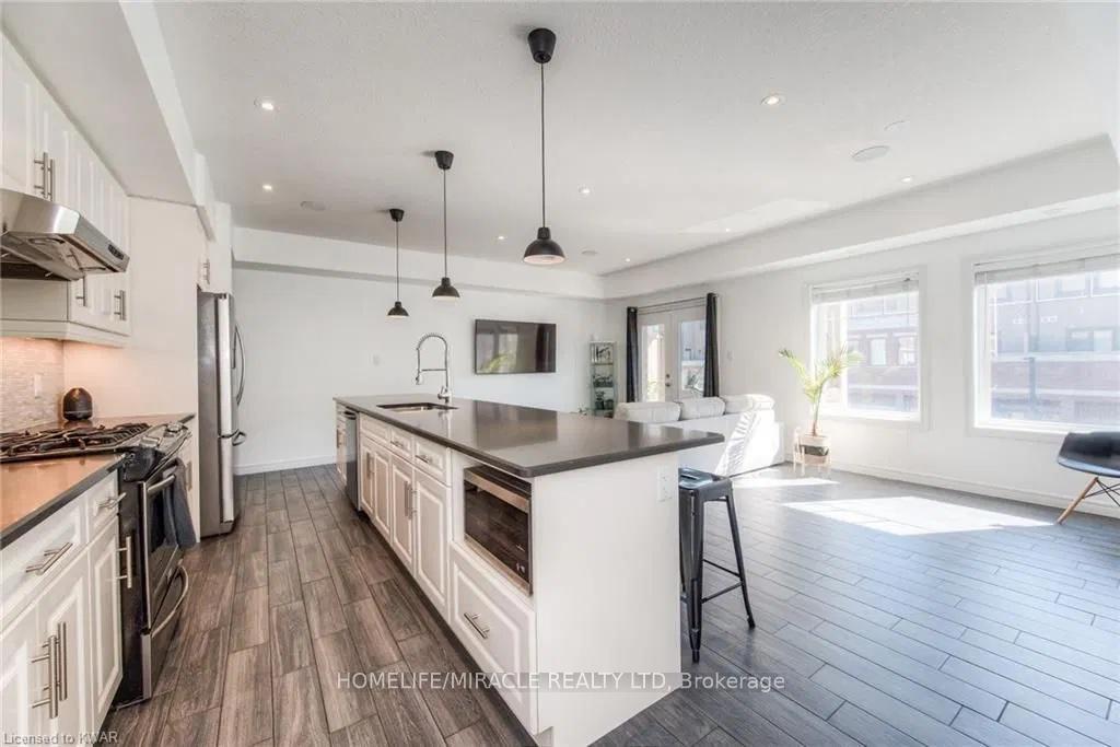 Photo 7 of Unit A7, 70 Willowrun Drive, Kitchener, Idlewood/Lackner Woods — HOMEH