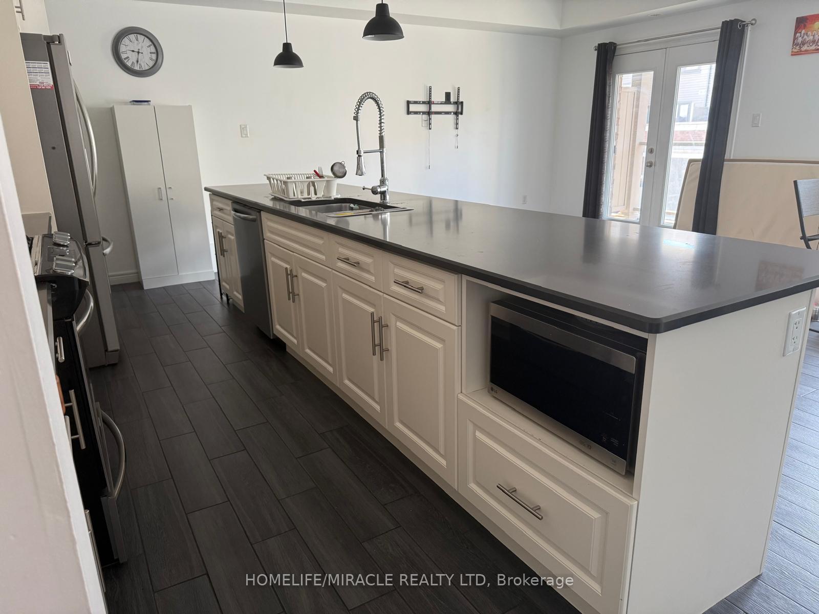 Photo 10 of Unit A7, 70 Willowrun Drive, Kitchener, Idlewood/Lackner Woods — HOMEH