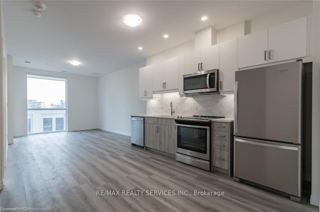 Photo 4 of Unit 405, 60 Charles Street, Kitchener, City Commercial Core — HOMEH