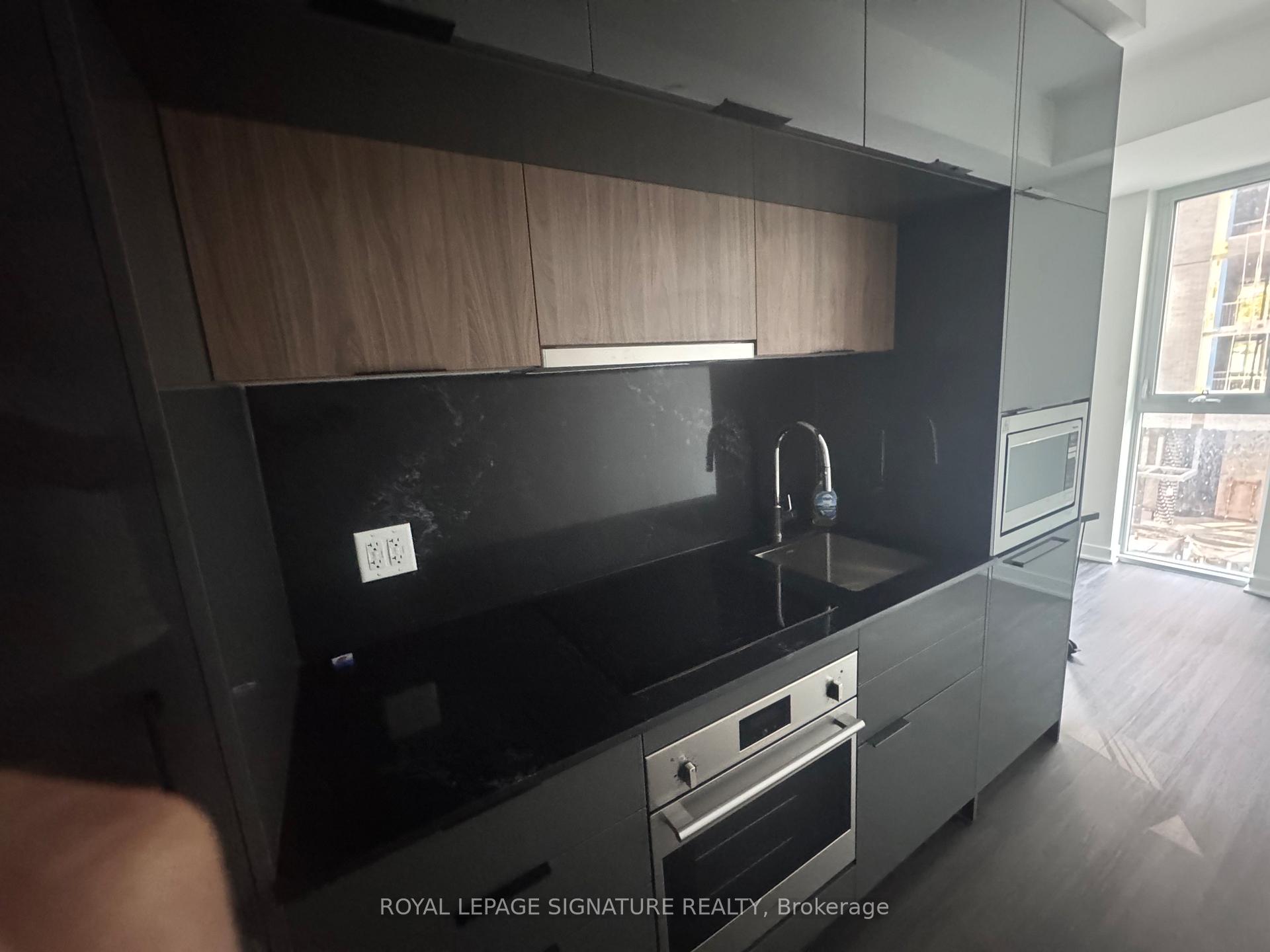 Photo 5 of Unit 301, 900 St Clair Avenue W, Toronto, Oakwood Village — HOMEH