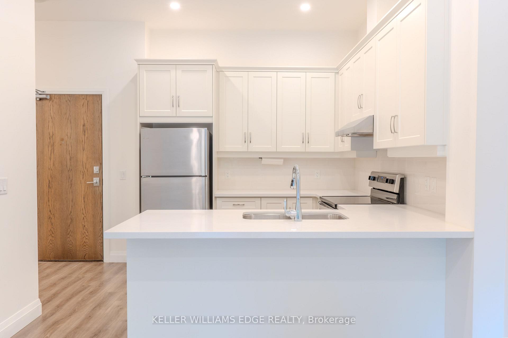 Photo 4 of Unit 103, 30 Hamilton Street S, Hamilton, Waterdown — HOMEH
