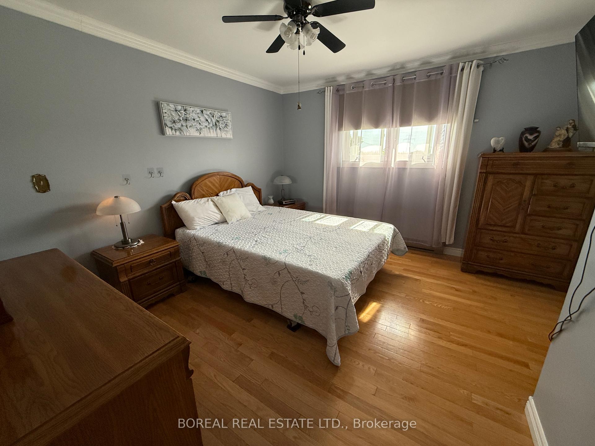 Photo 31 of 35 Eighteenth Avenue, Cochrane — HOMEH