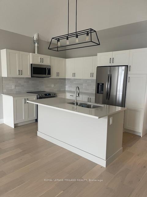 Photo 2 of Unit 4, 63 Compass Trail, Central Elgin, Rural Central Elgin — HOMEH