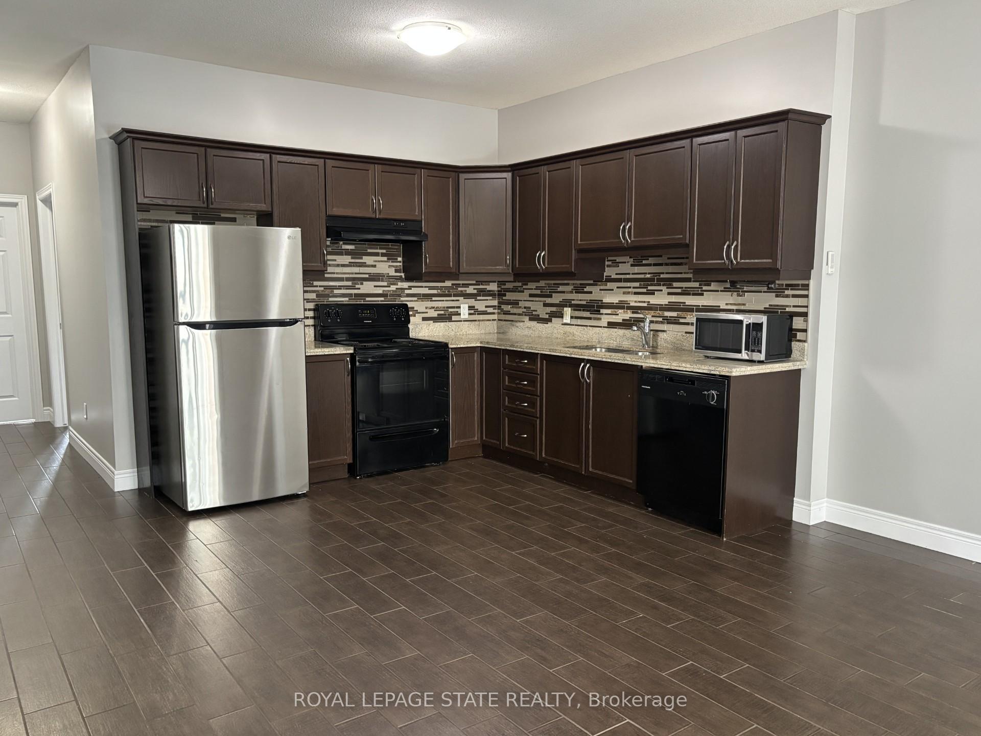 Photo 1 of Unit 2, 136 King Street W, Hamilton, Stoney Creek — HOMEH