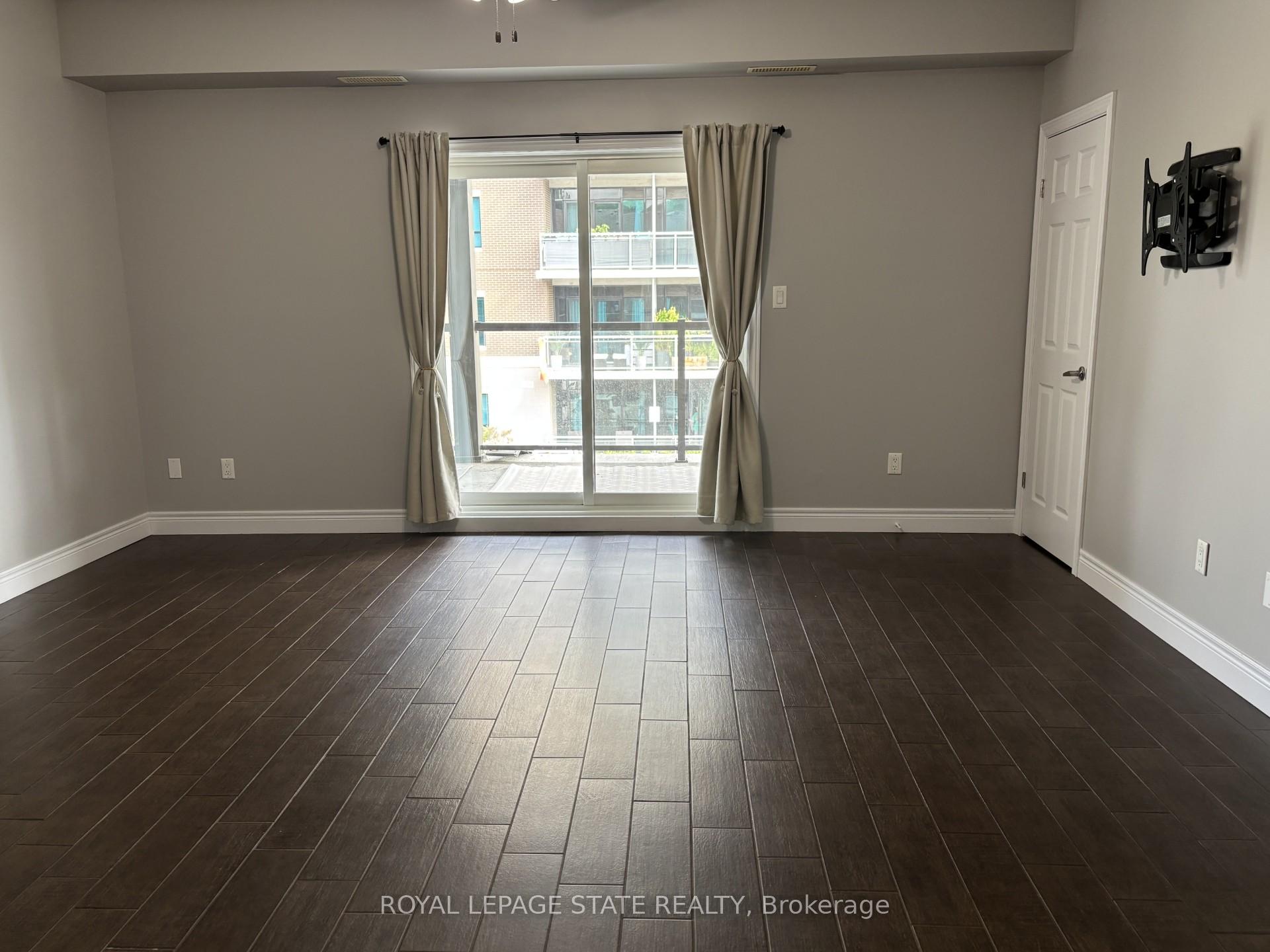 Photo 3 of Unit 2, 136 King Street W, Hamilton, Stoney Creek — HOMEH