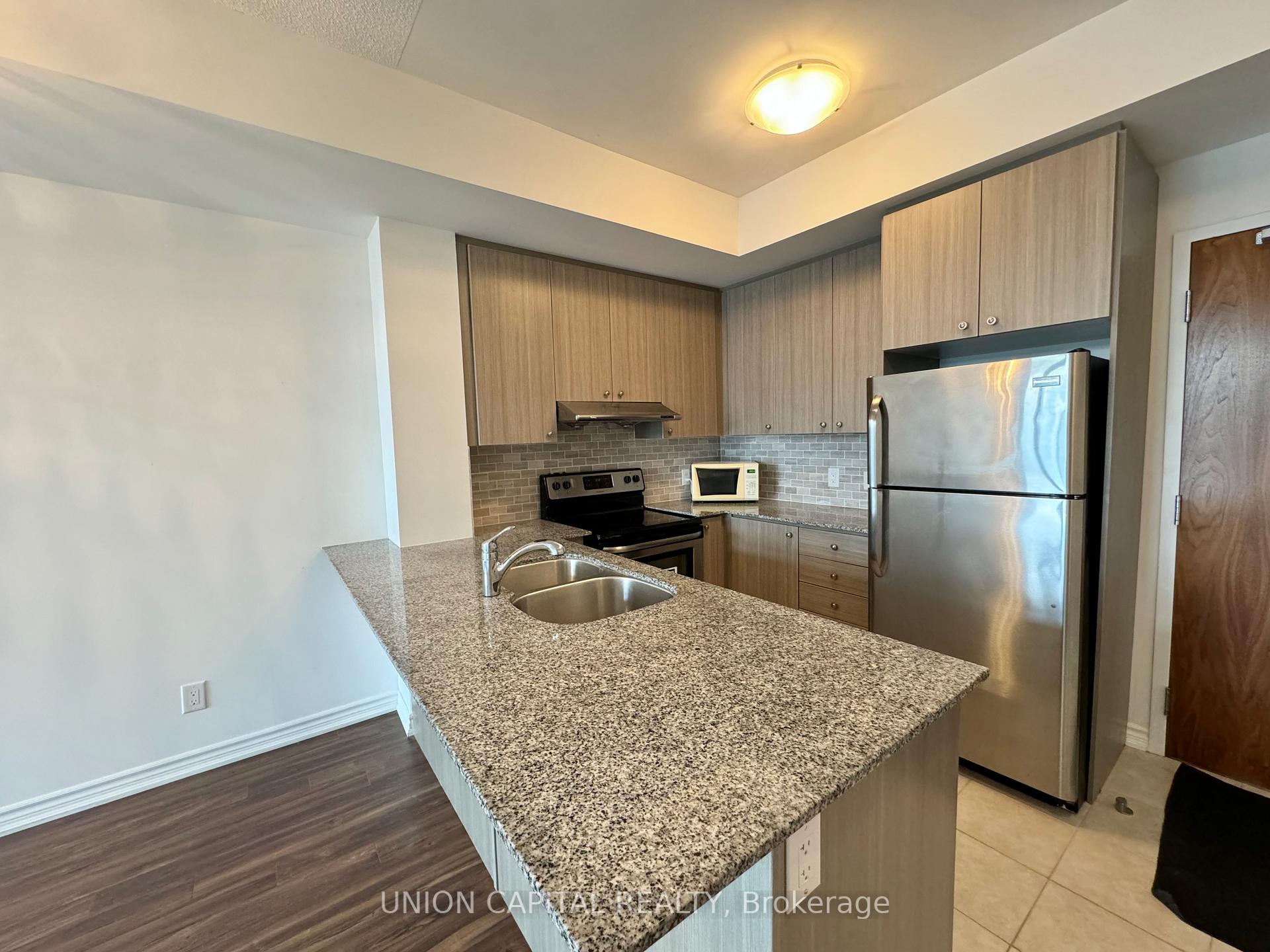 Photo 9 of Unit 217, 8323 Kennedy Road, Markham, Village Green-South Unionville — HOMEH